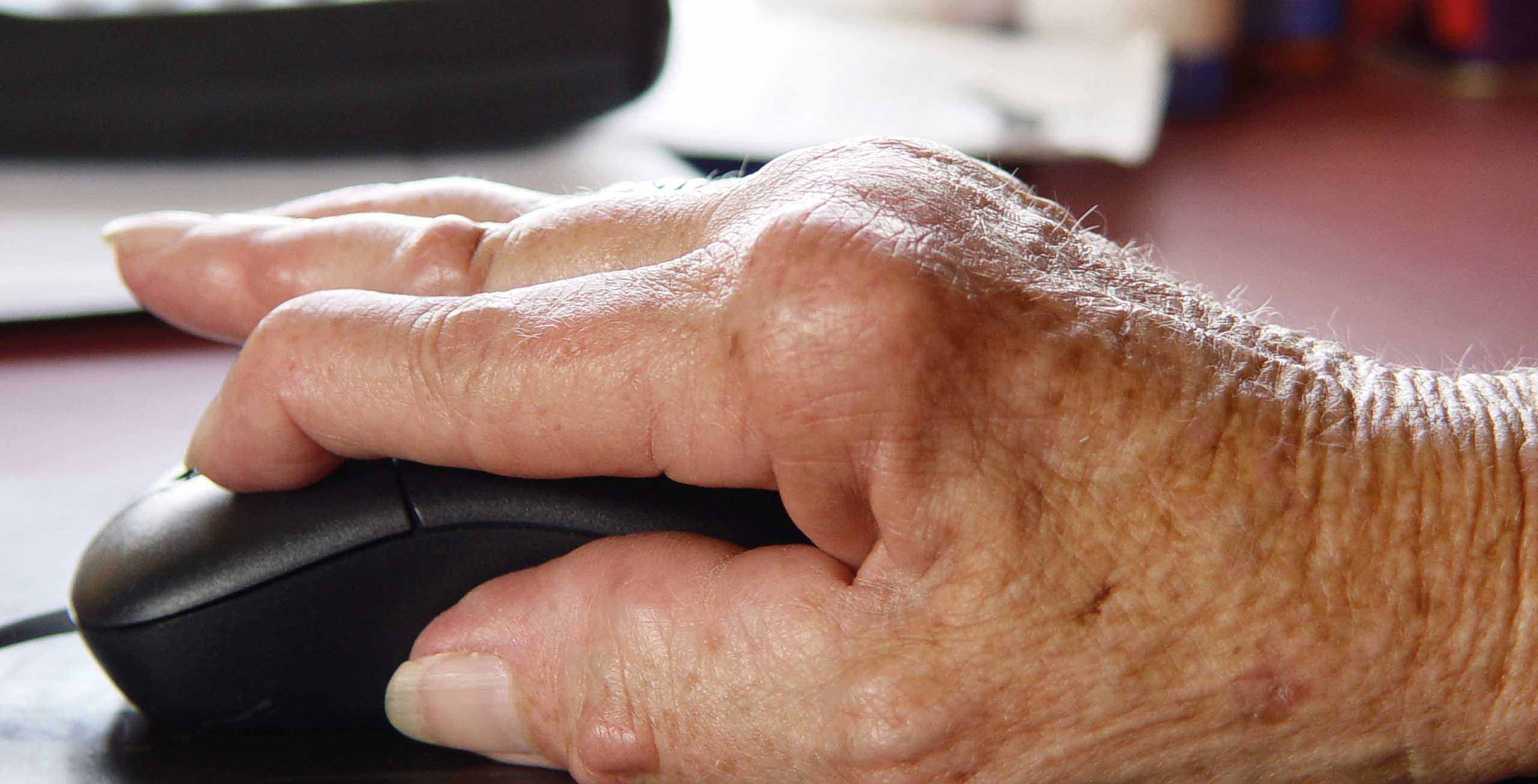 Rheuma hand on mouse